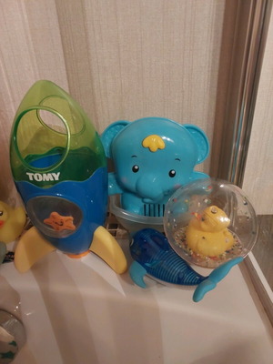 Bath toys used, pack with rocket, elephant, duck and dolphin