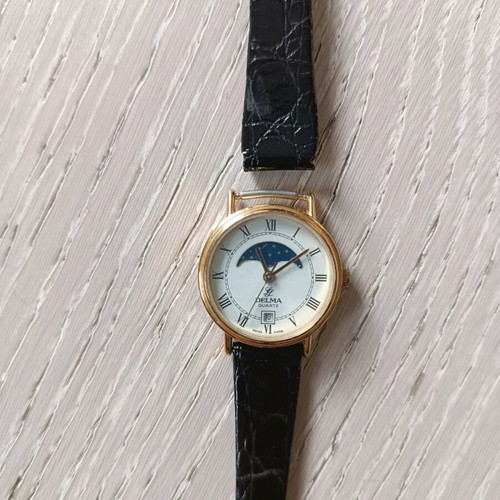 Delma watch moon phase women's used, needs strap