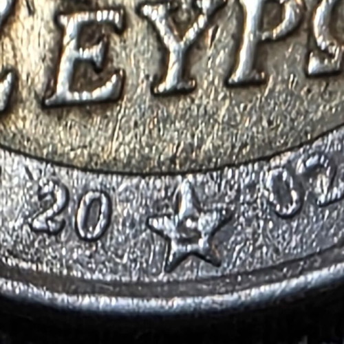 2 Euro 2002 Greece coin with 4 minting errors