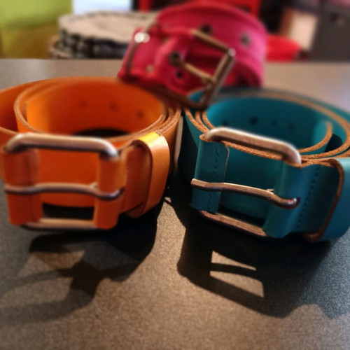 Three Benetton belts used, two leather and one fabric