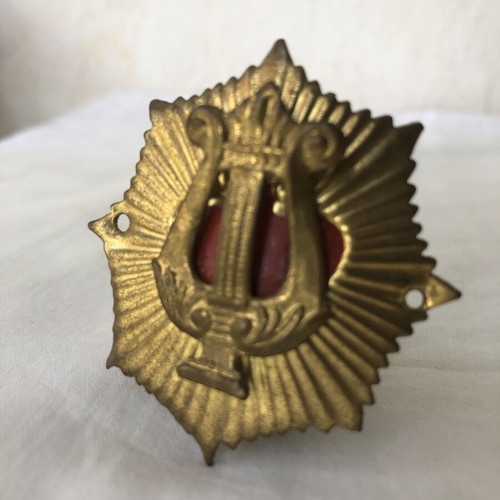 Metal badge of philharmonic musician's cap, like new