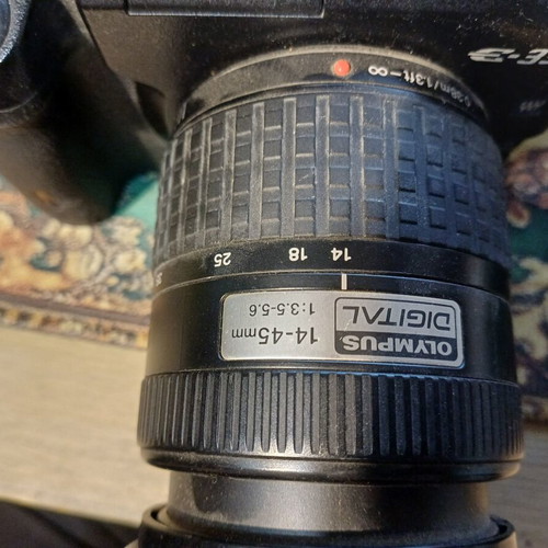 Olympus E-330 DSLR camera used with Zuiko Digital 14-45mm lens
