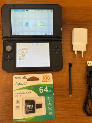Nintendo 3DS XL like new with Luma, 64GB card and 40 games
