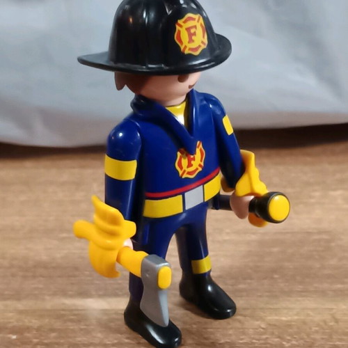 Playmobil Firefighter with Axe and Flashlight like new