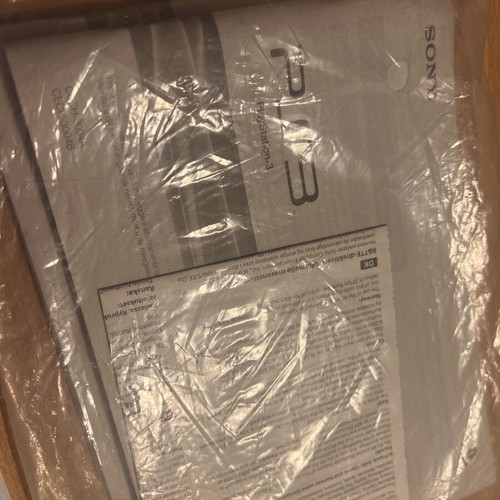 PS3 and PS4 manuals, one sealed