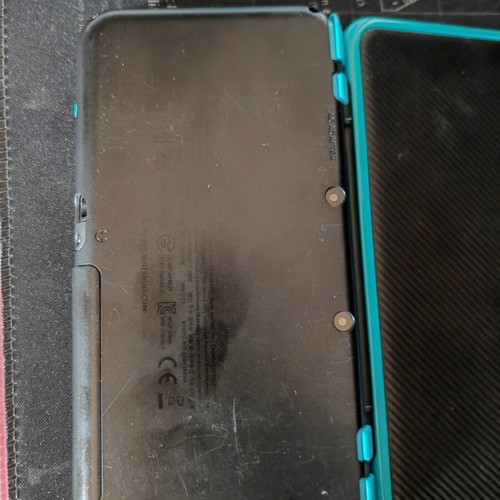 Nintendo 2DS XL like new with stylus, charger, and 4GB SD card