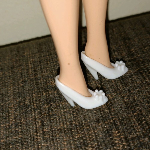 White doll shoes used with flower for vintage dolls
