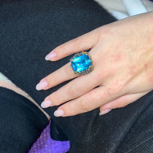 Silver ring plated with 9K gold, like new, blue topaz center