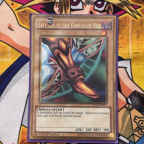 Left Leg of the Forbidden One Yu-Gi-Oh! TCG card like new, premium gold rare 1st Edition