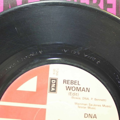 DNA Rebel Woman 7'' vinyl used, pop