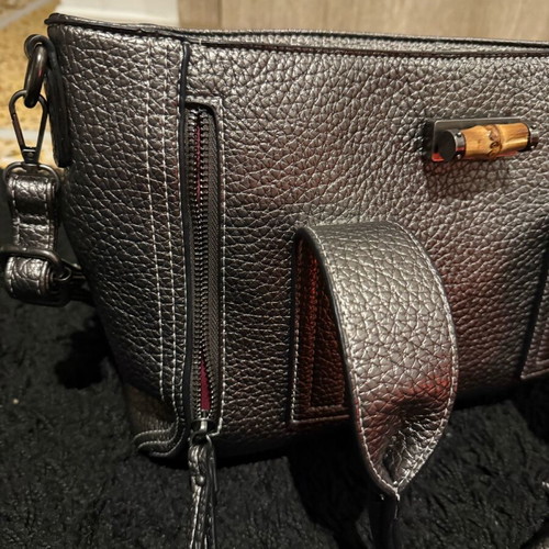 Nora’s silver handbag new with shoulder strap