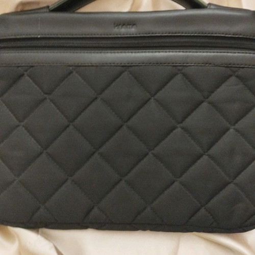 Knomo tablet sleeve bag used, leather and quilted fabric