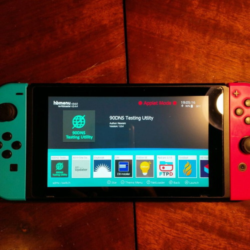 Nintendo Switch console with custom firmware and 126GB SD card