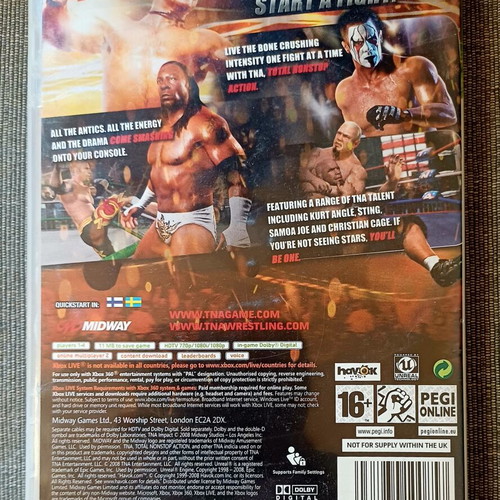 TNA Impact Xbox 360 game used with bonus DVD and collectible double-sided cover