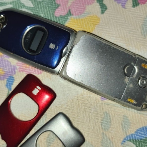 Nec mobile phone used with extra covers, collectible