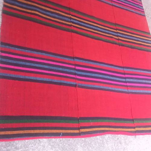 Authentic 100 percent handwoven wool rug used