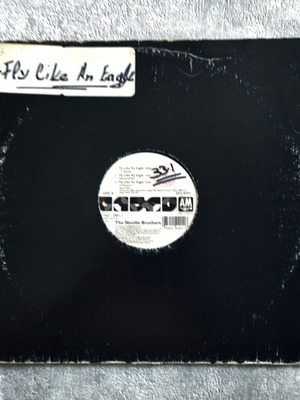 The Neville Brothers Fly Like An Eagle 12'' βινύλιο μεταχειρισμένο