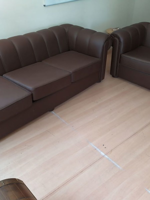 Leather living room set like new with three-seat sofa, two-seat sofa and armchair