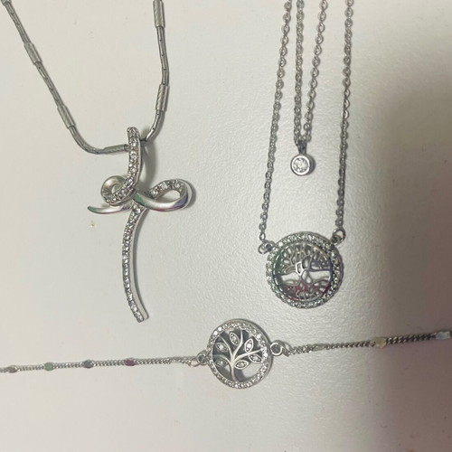 Silver cross, necklace and bracelet set like new
