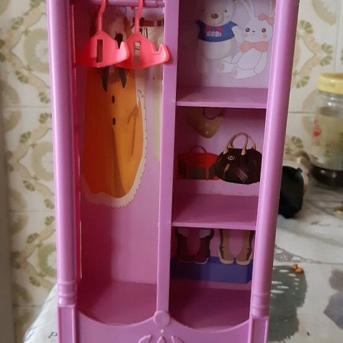 Doll wardrobe used pink with 2 hangers