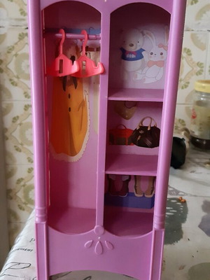 Doll wardrobe used pink with 2 hangers