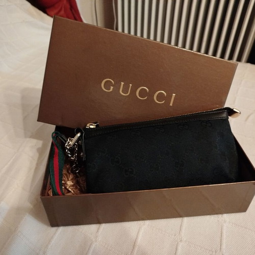 Gucci fabric wrist pouch like new, black