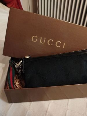 Gucci fabric wrist pouch like new, black