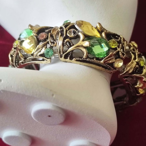 Vintage bracelets with gold finish and multicolored stones