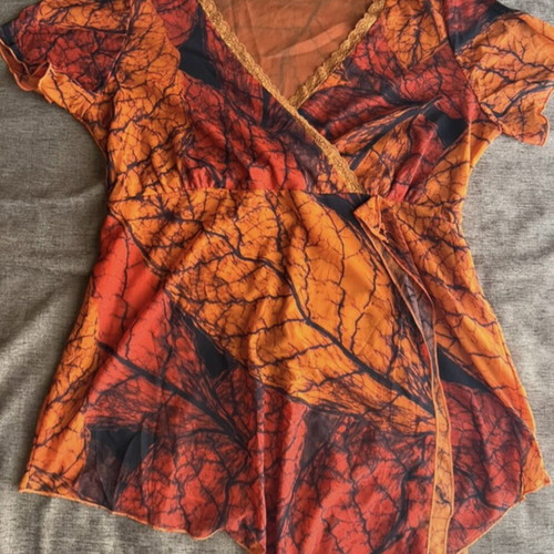 Miracle blouse like new, black and orange, size XL