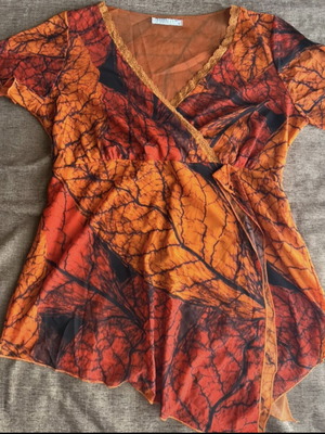 Miracle blouse like new, black and orange, size XL