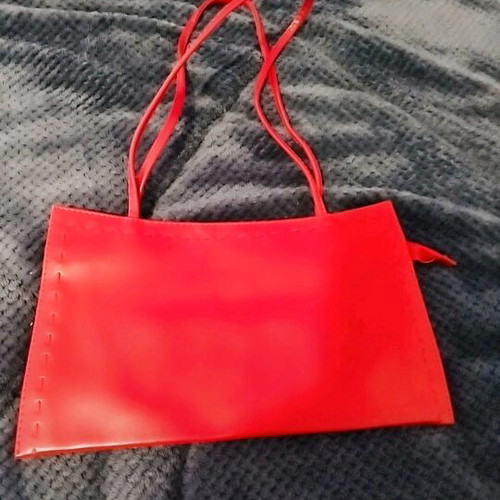 Red shoulder bag minimal design with thin straps, new