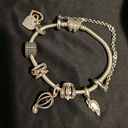 Pandora bracelet authentic used size 16 with 6 charms and safety chain