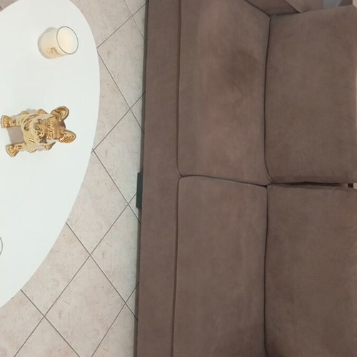 Three-seater sofa new, cigar color