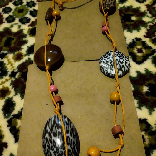 Necklace used, black and silver pendant