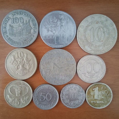 Indonesian, German, Yugoslavian, Italian, Tunisian, Swiss and Cypriot coins