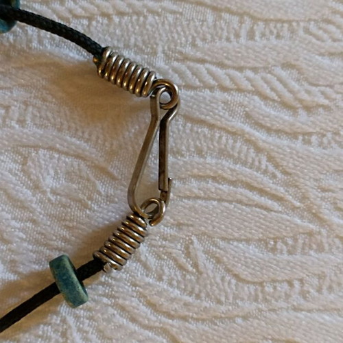 Handmade necklace used with beads in pink, sky blue, and green shades