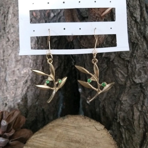 Earrings with olive leaf design and green stones