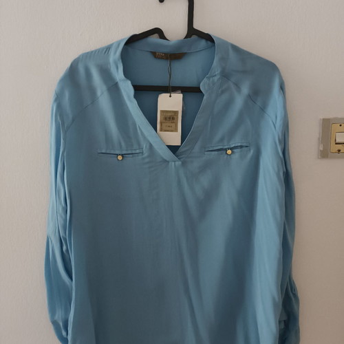 Shirt sky blue new, size L fits better M