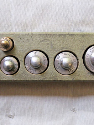 Set of old brass weights used with case