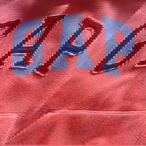 GAP kids hoodie used for ages 8-9, orange color