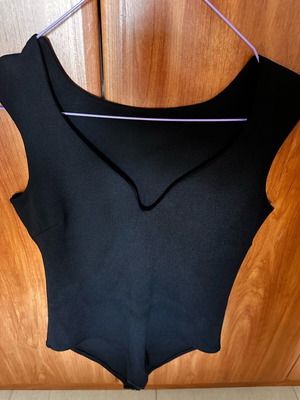 Black bodysuit like new, size small-medium with built-in cups