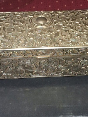 Jewelry box like new with embossed silver designs