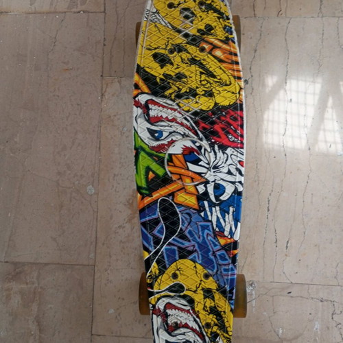 Penny Board skateboard like new with crazy graphics