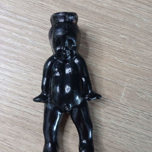 Vintage black plastic boy figure used
