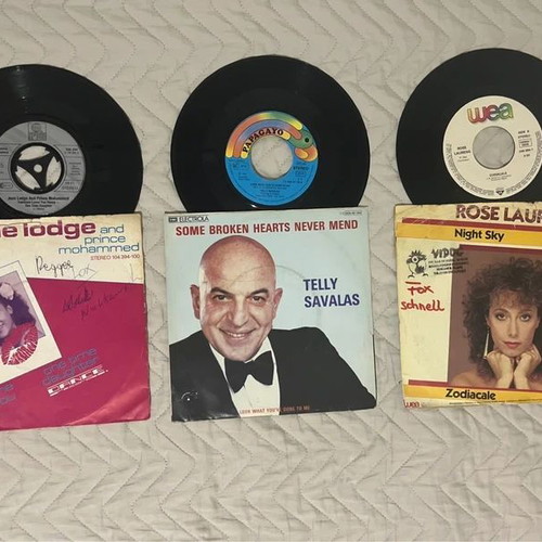 45 RPM record collection like new, lot of 14 discs