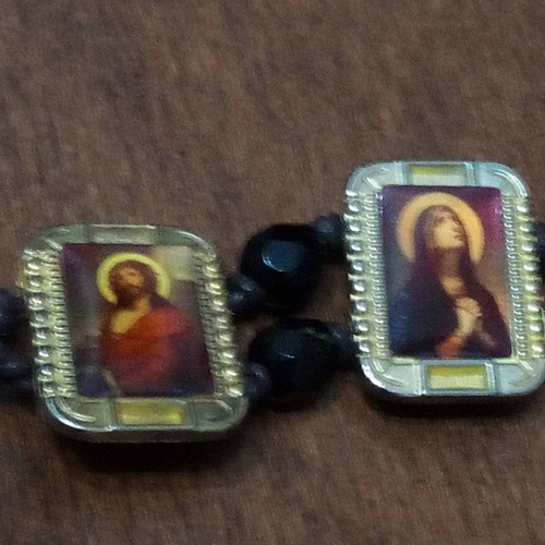 Double amulet bracelet with miniature images of Jesus and Virgin Mary catholic style