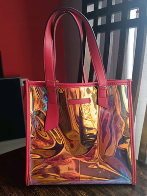 Red handbag used with signs of wear