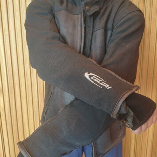 Motorcycle jacket used with hard protectors and leather