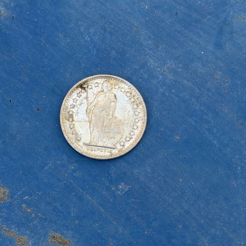 Swiss coin cut in 1969, used