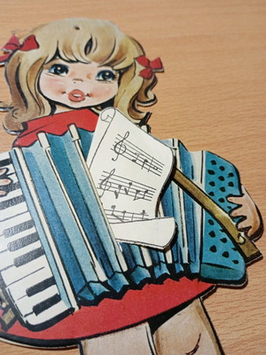 Vintage greeting card like new, girl with accordion